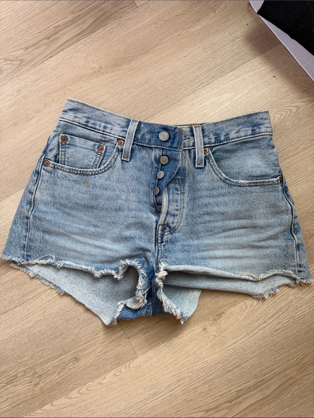 Levi's Faded Light Blue Button-Fly Denim Cutoff Shorts